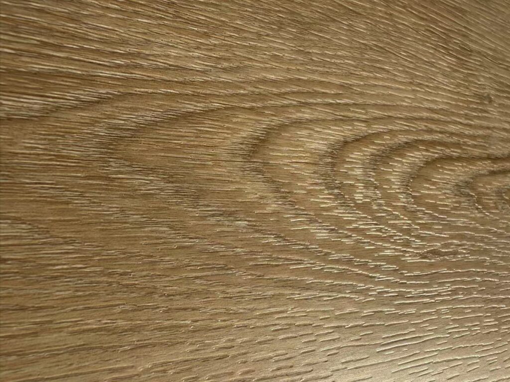 Detailed texture of EIR Embossed In Register SPC flooring surface