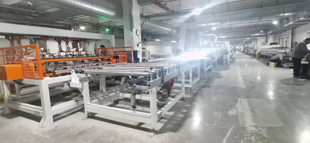 High-precision Unilin click-locking system production line at Ecoflors factory.