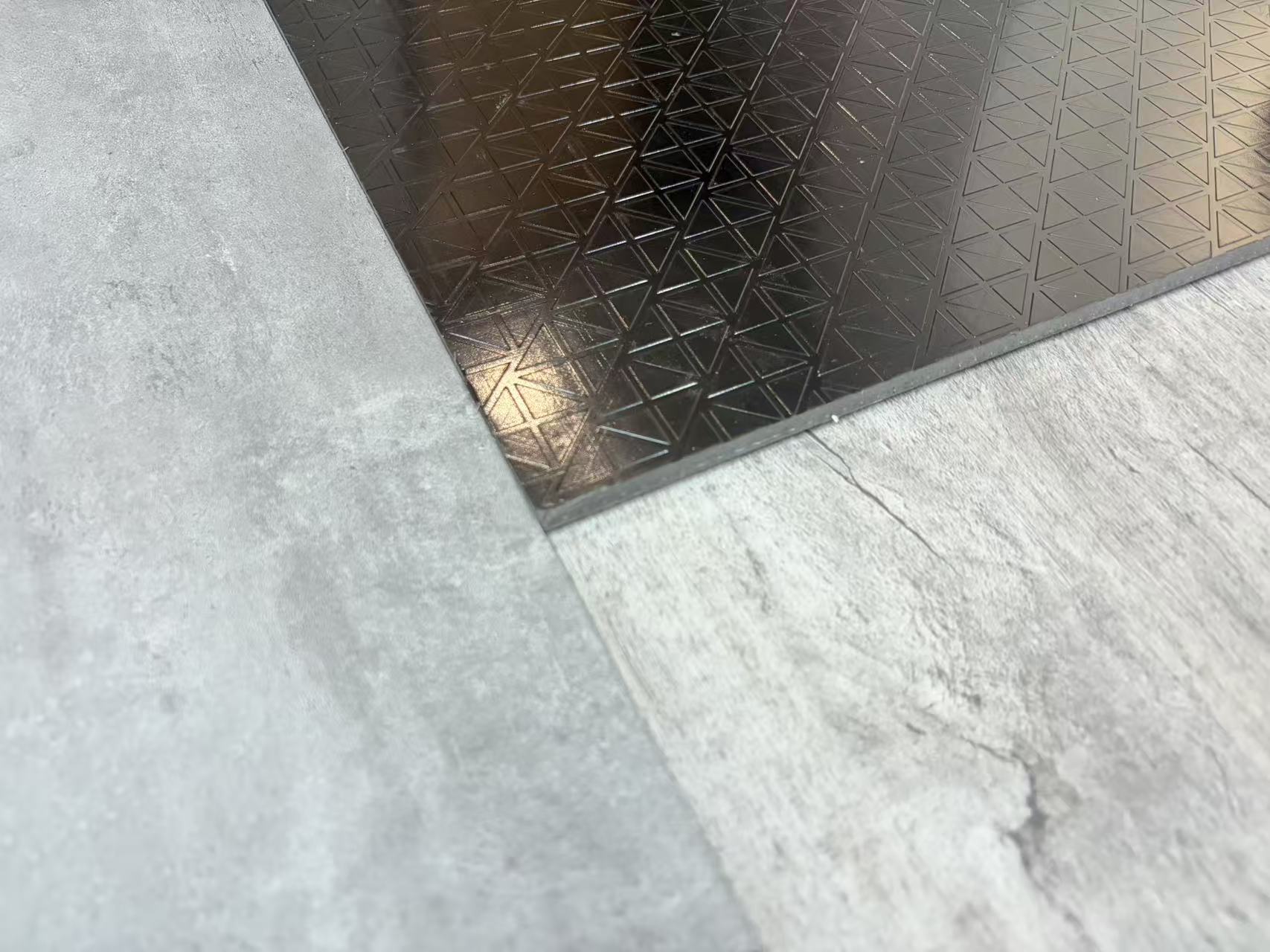 Loose Lay LVT friction backing detail — specialised grip backing enables no-adhesive installation