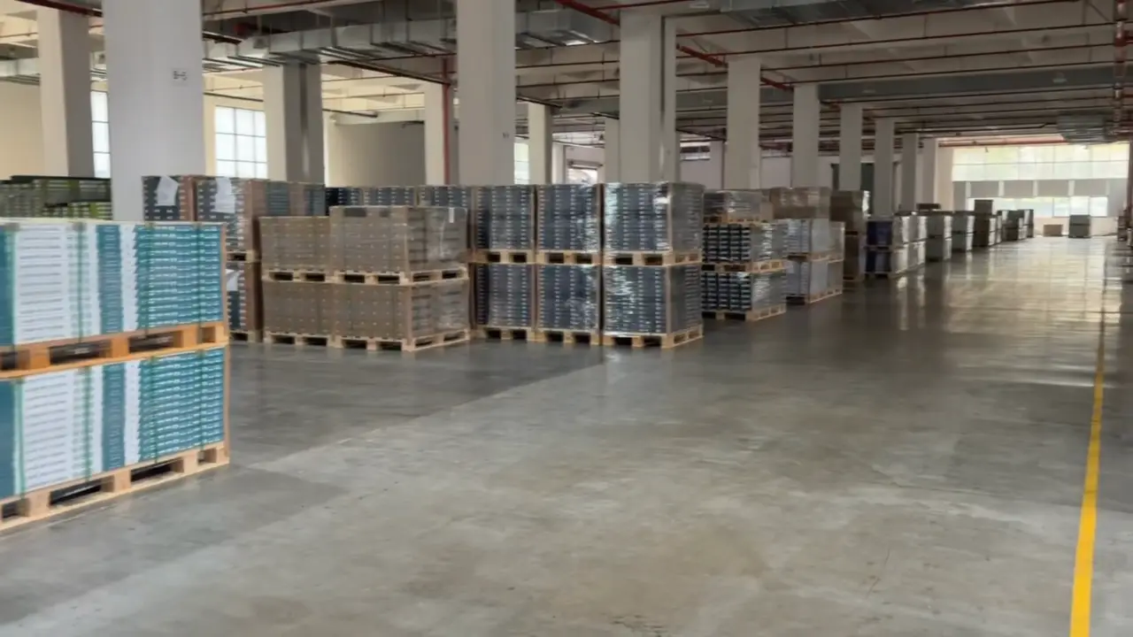 Packed flooring cartons on pallets in a warehouse